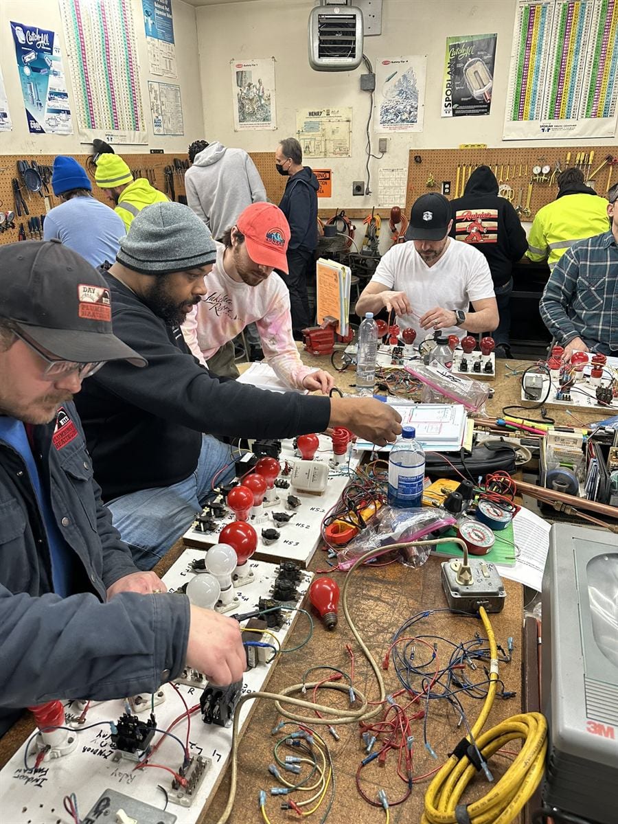 ACHP 106 student walking through a step-by-step service procedure