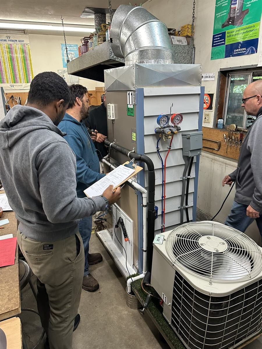RS 103 student measuring with gauges on a service simulation